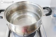 榄菜蛤蜊粥的做法图解7