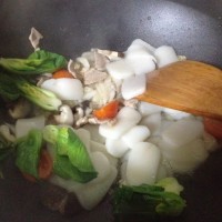 鲜美泡菜肉片炒年糕的做法图解9