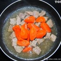 ţ
