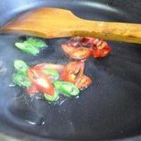ţ