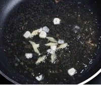 ţ