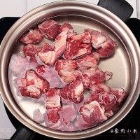 ţ
