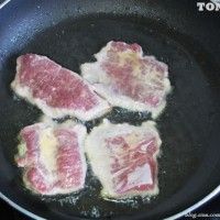 ţ