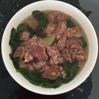 ţ
