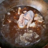 ţ