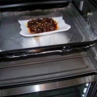 ţ