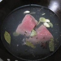 ţ