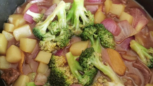 ţ