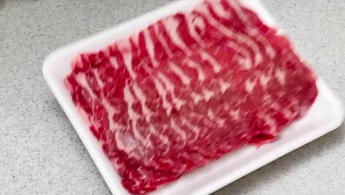 ţ