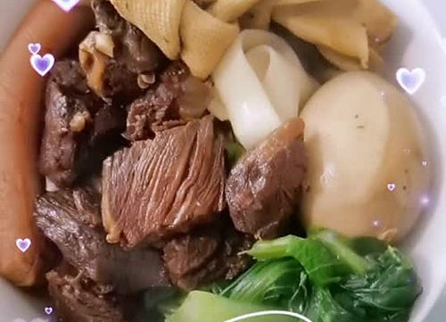 ţ