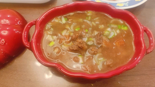 ţ