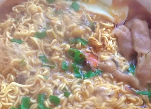 ţ