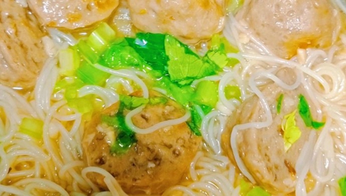 ţ