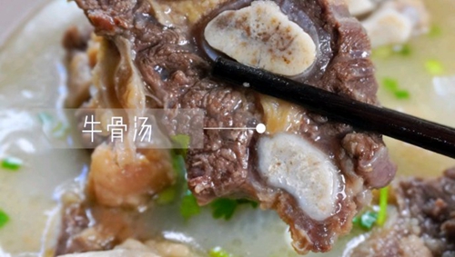 ţ