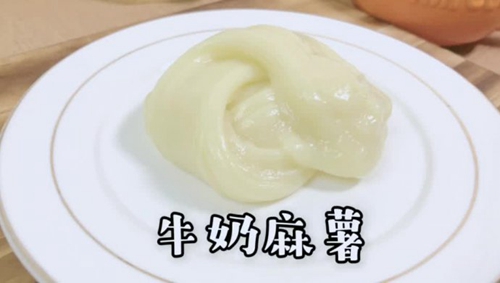ţ