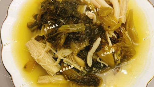 ţ