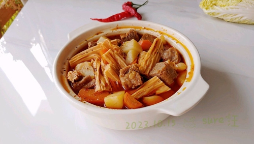 ţ