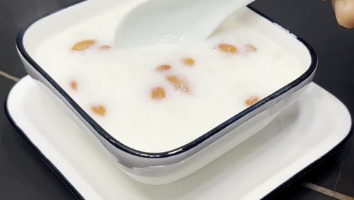 ţ
