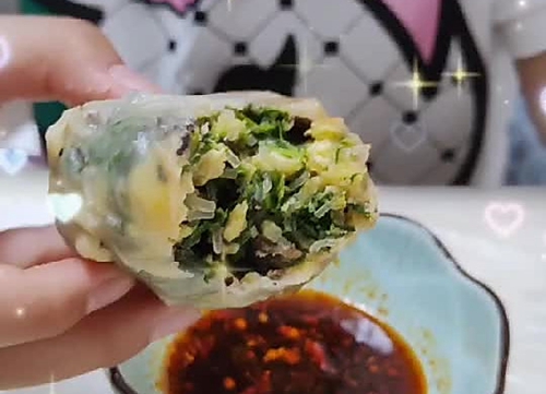 ޣ