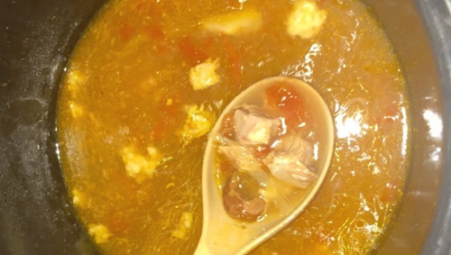 ţ