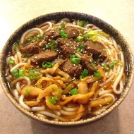 ţ