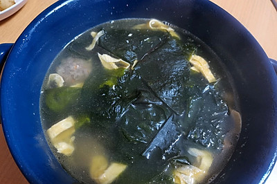 ţ