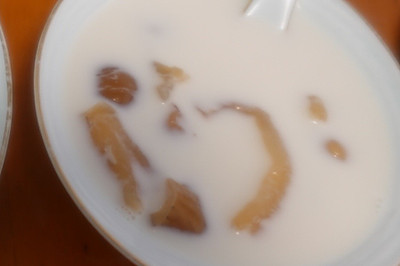 ţ