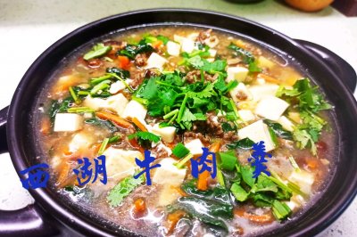 ţ
