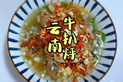 ţ