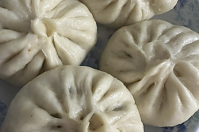 ţ